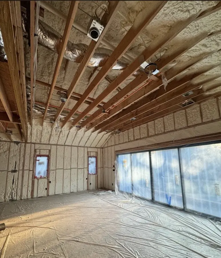 Interior walls and ceiling insulated with spray foam during new construction in White Oak